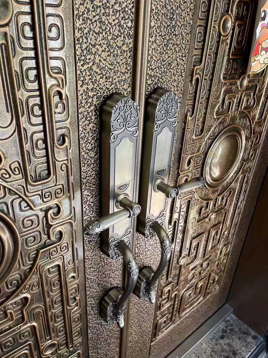 CaremLock villa lock installed on a brass double entrance door